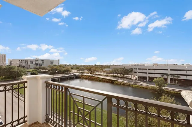 a view of a city skyline from a balcony
