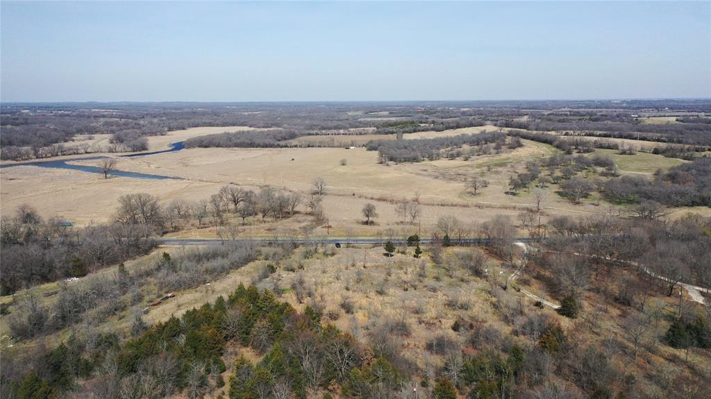 6484 Highway 56 Bells, TX 75414 - Photo 15 of 38 an aerial view of ocean and trees