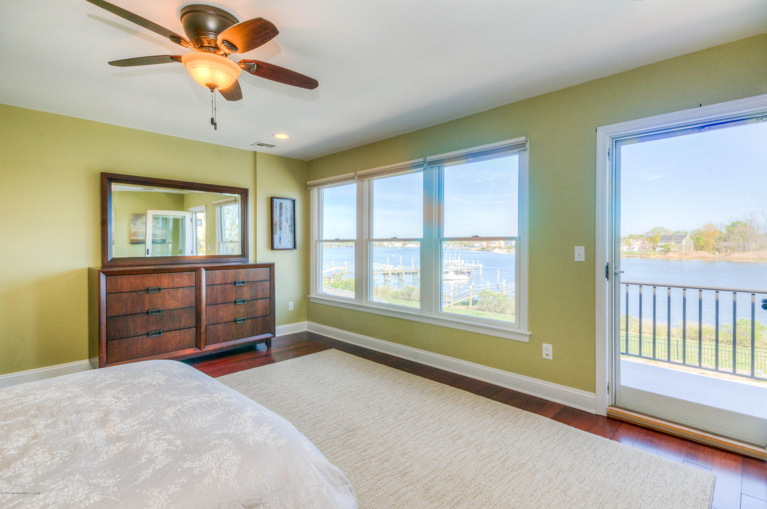 68 Rivers Edge Drive Little Silver, NJ 07739 - Photo 13 of 25 a spacious bedroom with a bed and a dresser
