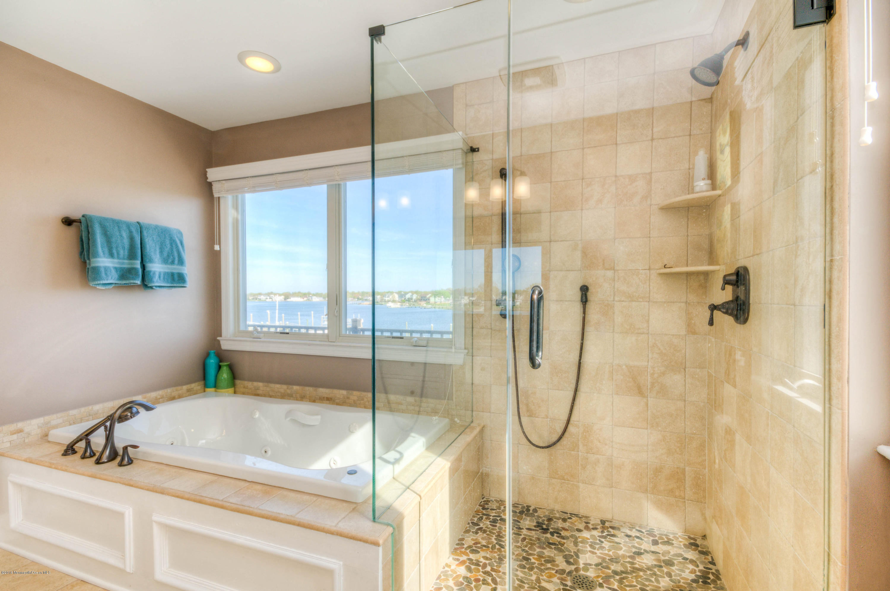 68 Rivers Edge Drive Little Silver, NJ 07739 - Photo 15 of 25 a bathroom with a granite countertop sink a mirror and shower