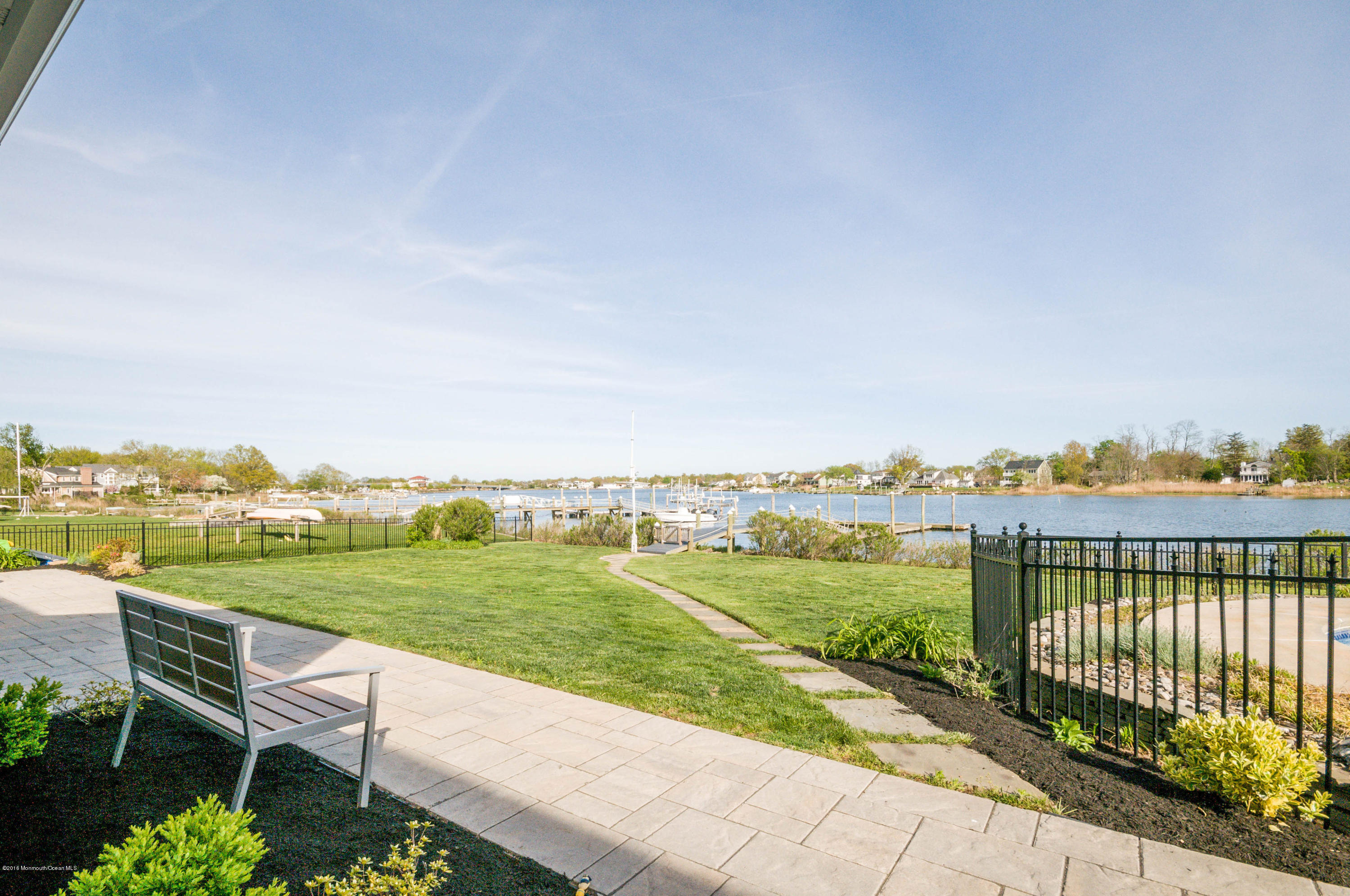 68 Rivers Edge Drive Little Silver, NJ 07739 - Photo 21 of 25 a view of a street with a garden and deck