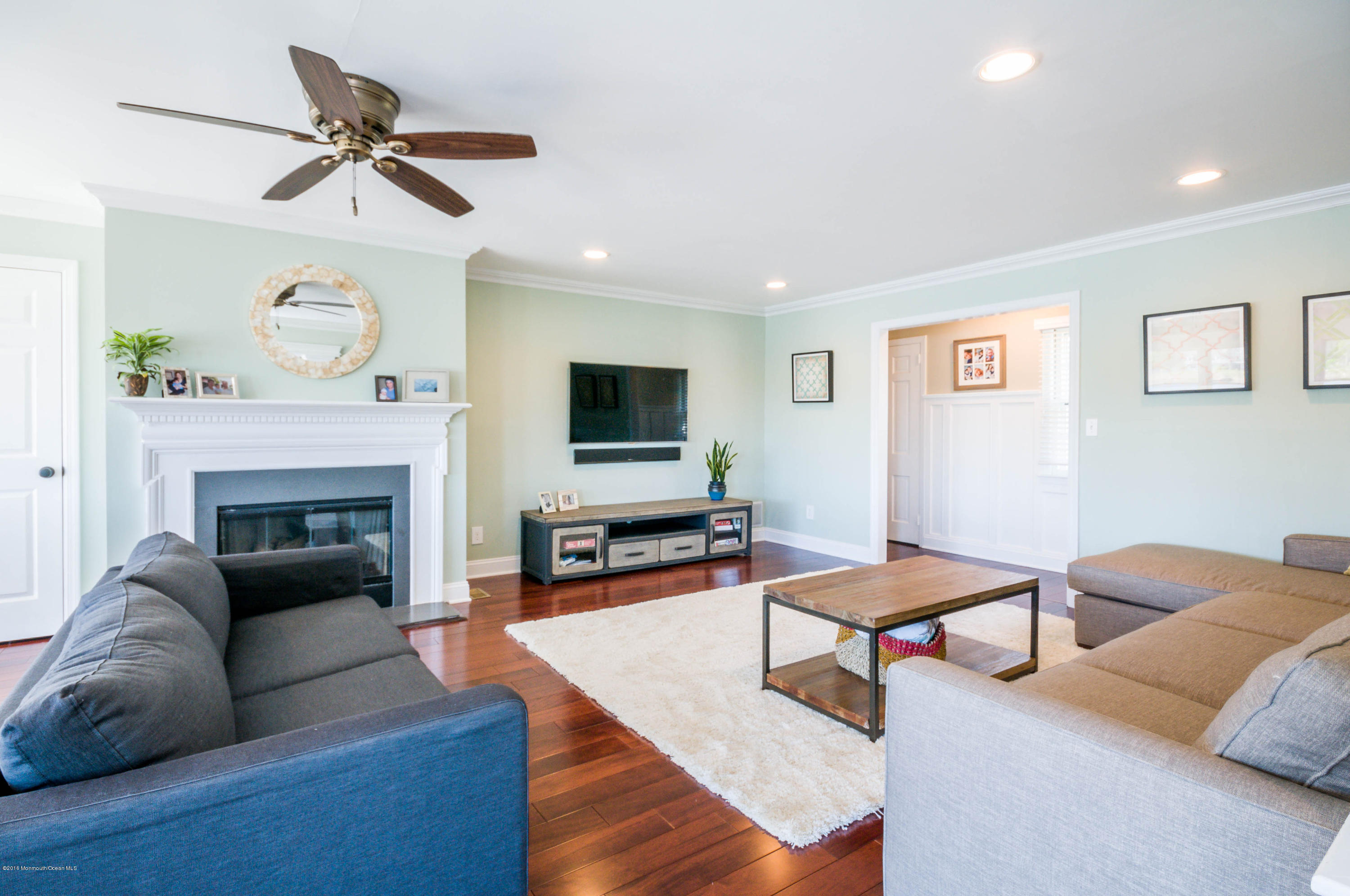 68 Rivers Edge Drive Little Silver, NJ 07739 - Photo 7 of 25 a living room with furniture and a fireplace