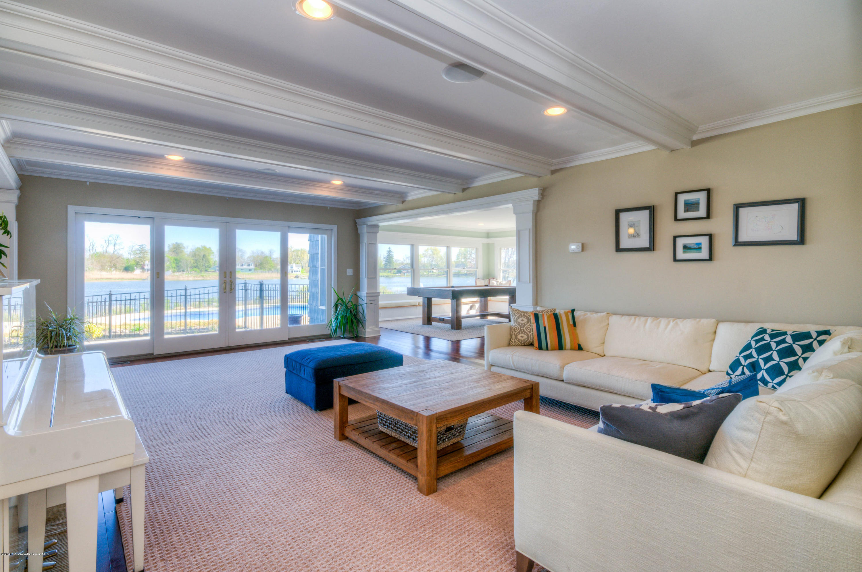 68 Rivers Edge Drive Little Silver, NJ 07739 - Photo 9 of 25 a living room with furniture and a large window