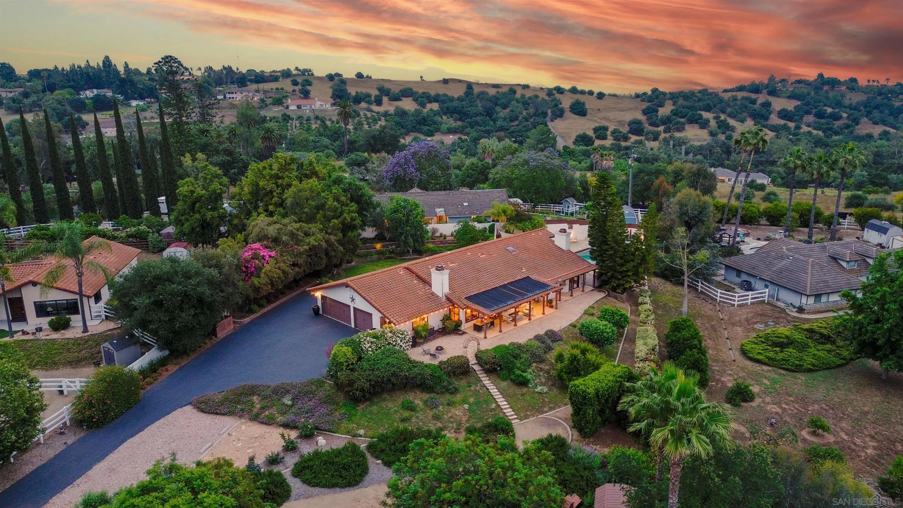 an aerial view of a house with a garden