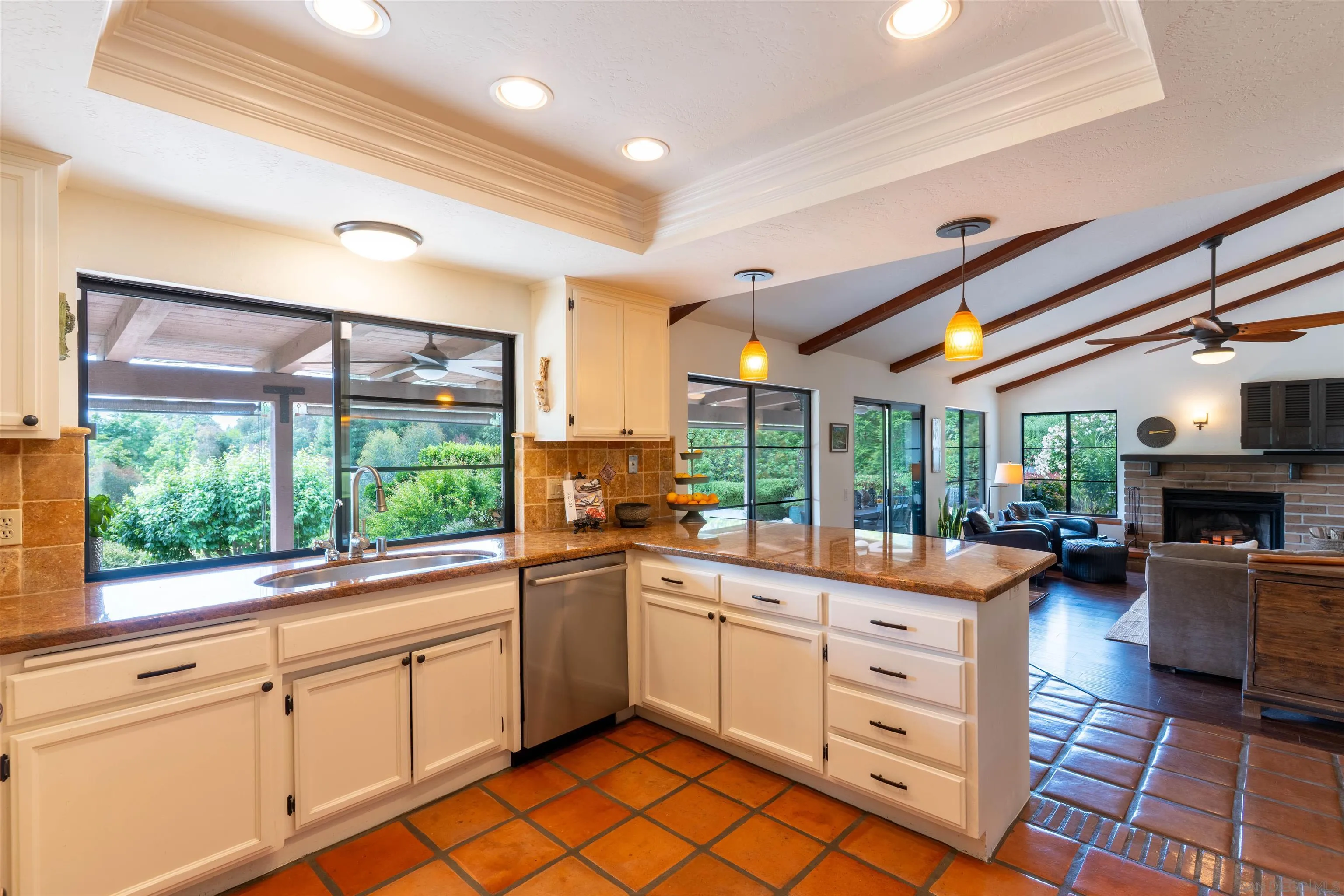 1036 Capra Way Fallbrook, CA 92028 - Photo 12 of 51 a kitchen that has a lot of cabinets in it