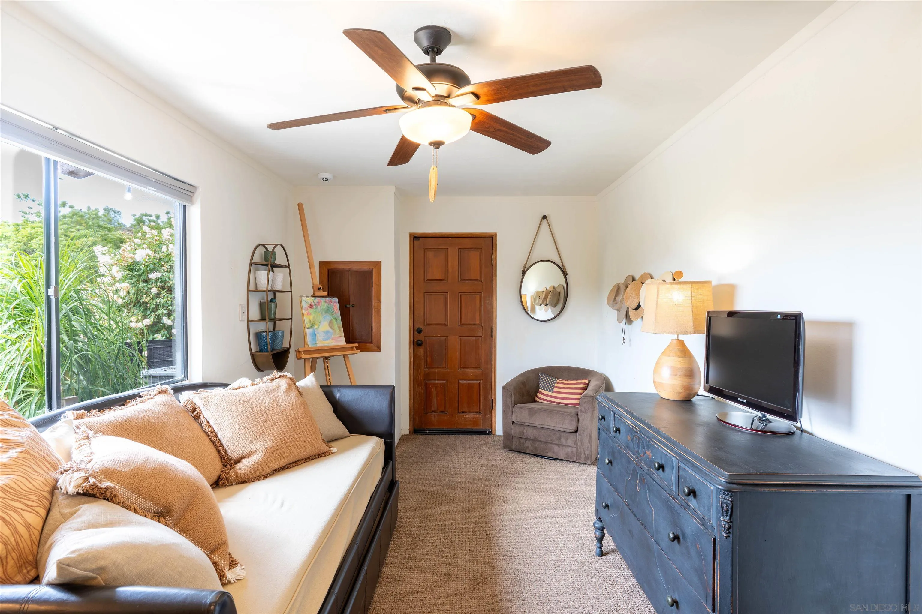 1036 Capra Way Fallbrook, CA 92028 - Photo 24 of 51 a living room with furniture and a window