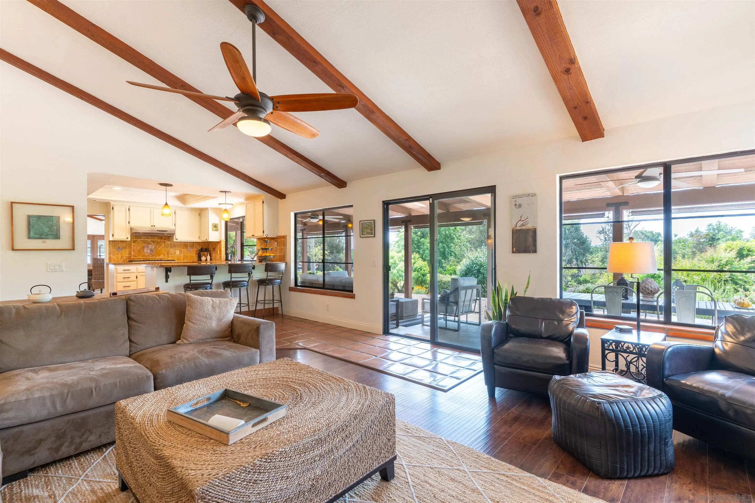 1036 Capra Way Fallbrook, CA 92028 - Photo 8 of 51 a living room with furniture and a large window