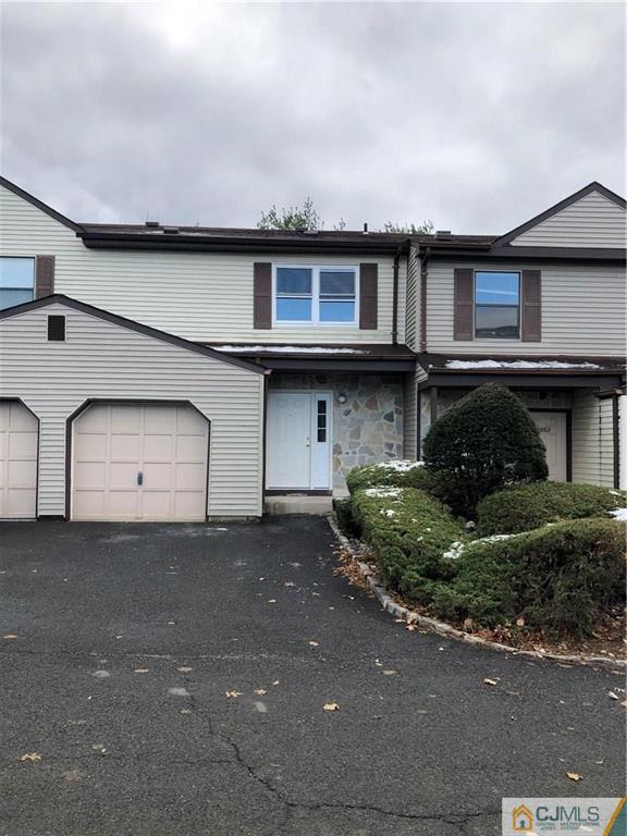3002 Hana Road Edison, NJ 08817 - Photo 1 of 15 a front view of a house with garage