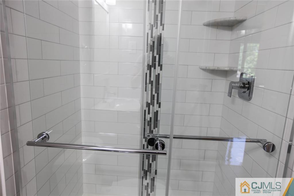 3002 Hana Road Edison, NJ 08817 - Photo 10 of 15 a bathroom with a shower