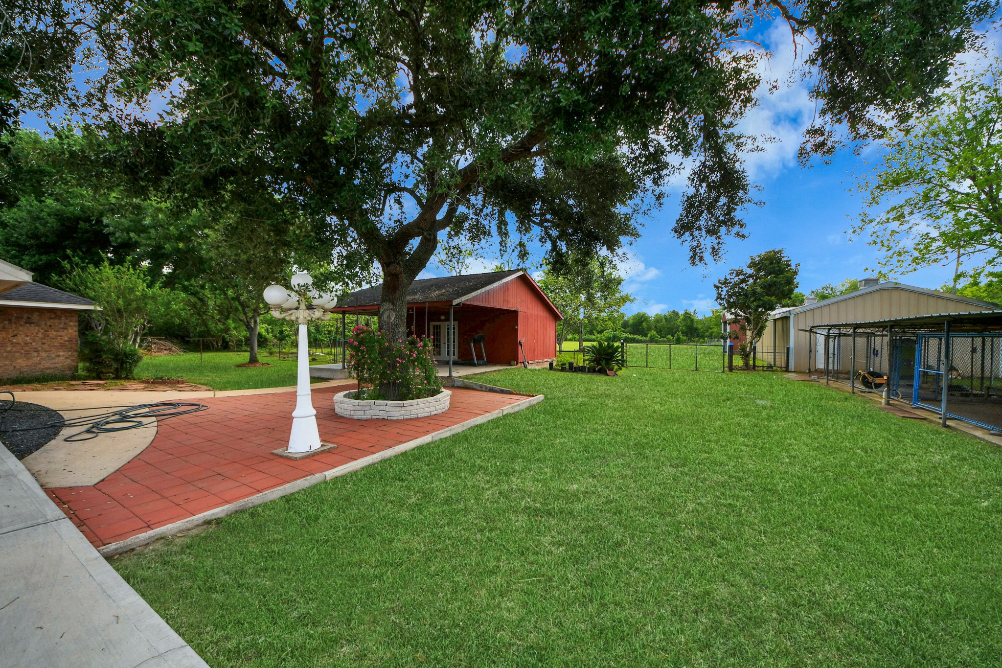 8407 Kirchner Road Manvel, TX 77578 - Photo 26 of 30 Backyard - Red outdoor storage is not included