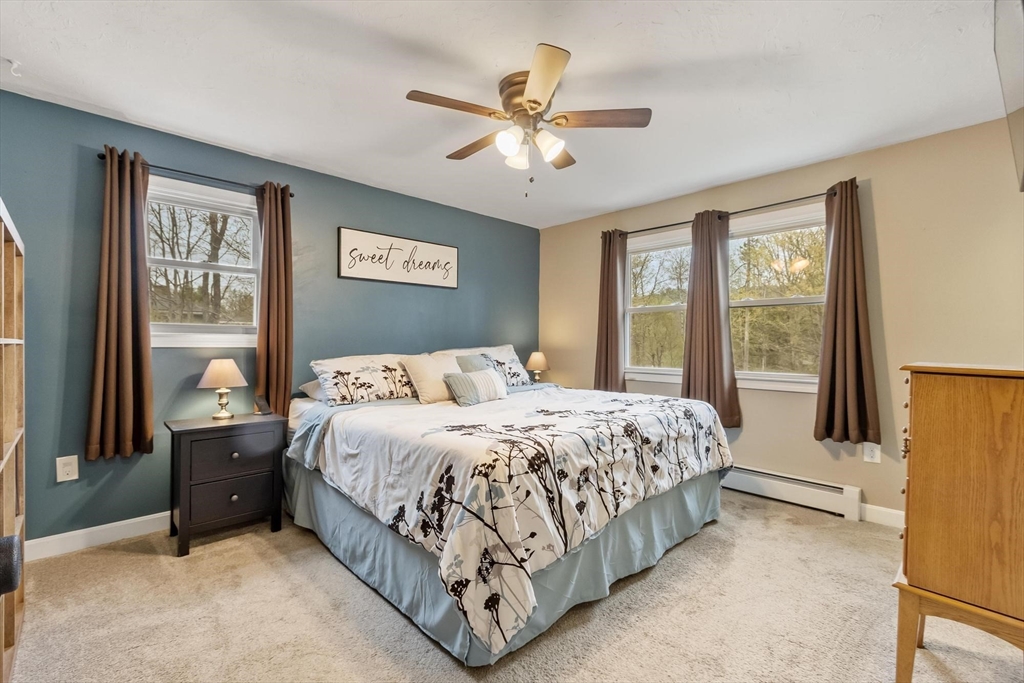 101 Williams Road Ashburnham, MA 01430 - Photo 30 of 42 a bedroom with a bed and window