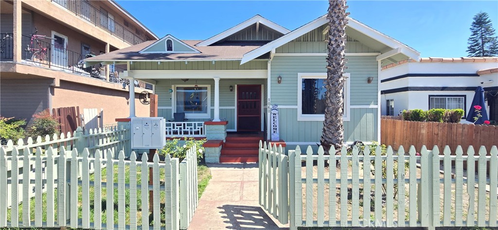 a front view of a house with a small yard