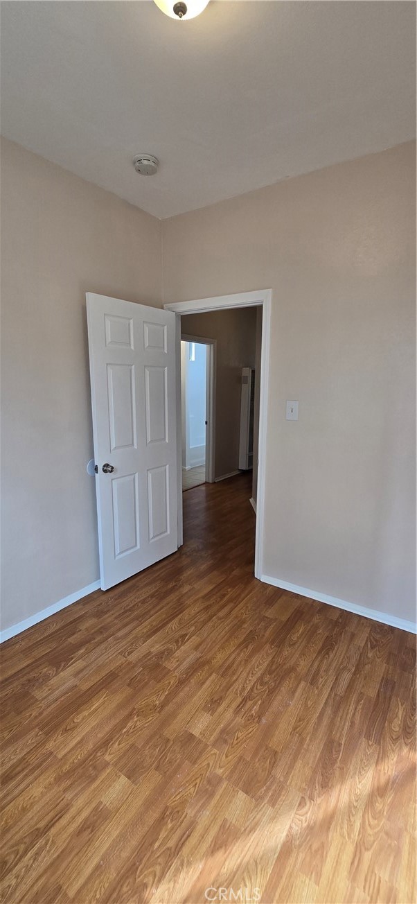 1060 Cherry, Unit A & B Long Beach, CA 90813 - Photo 49 of 63 a view of an empty room and wooden floor