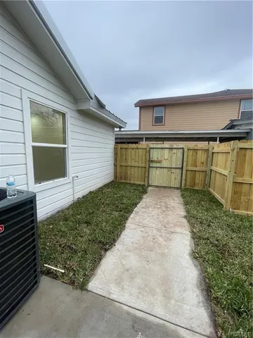 a view of backyard of house