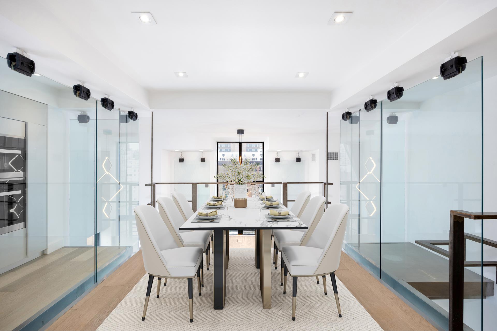 135 West 70th Street, Unit 10C Manhattan, NY 10023 - Photo 15 of 24 a view of a dining room with furniture and wooden floor