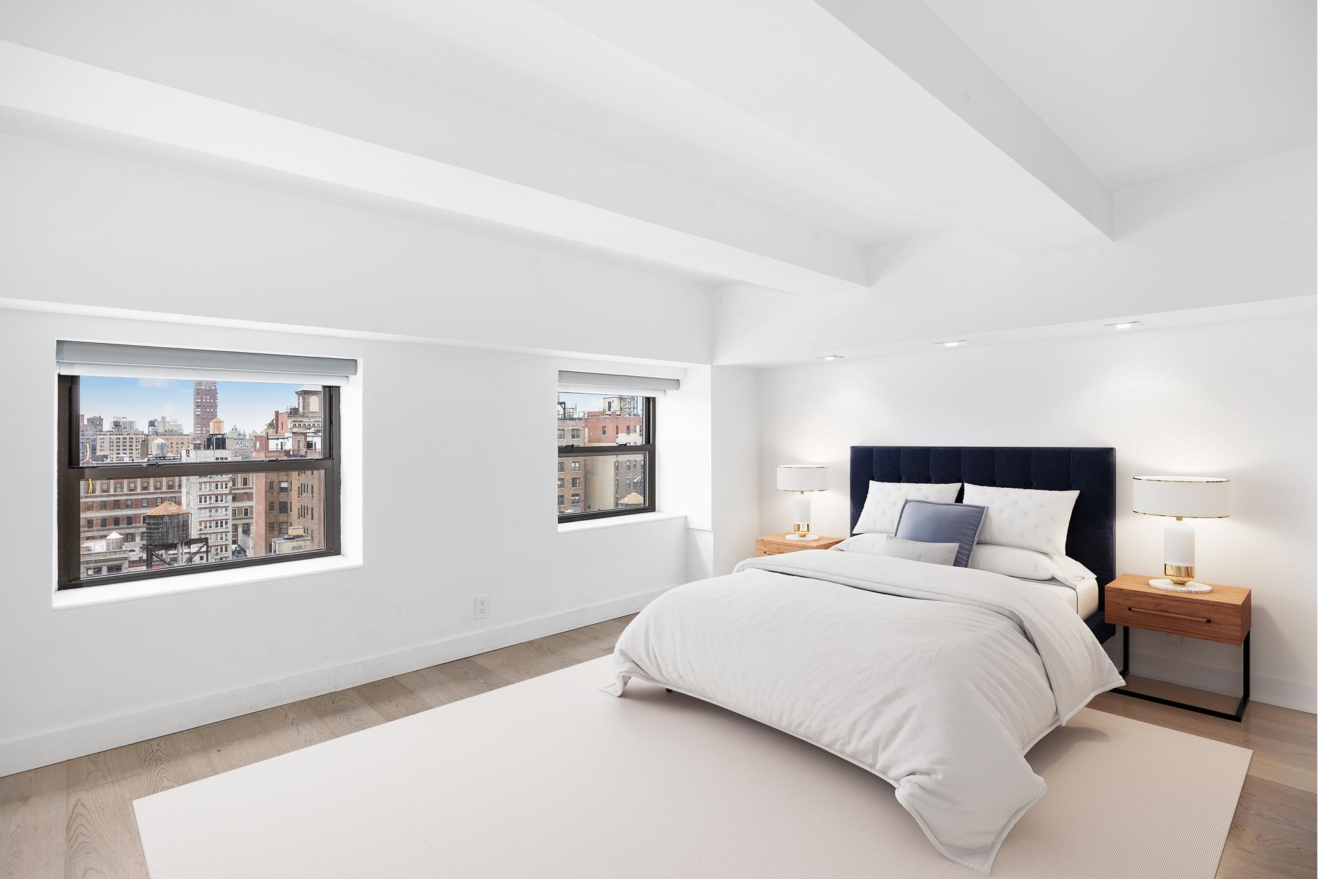 135 West 70th Street, Unit 10C Manhattan, NY 10023 - Photo 18 of 24 a bedroom with a bed and wall painting