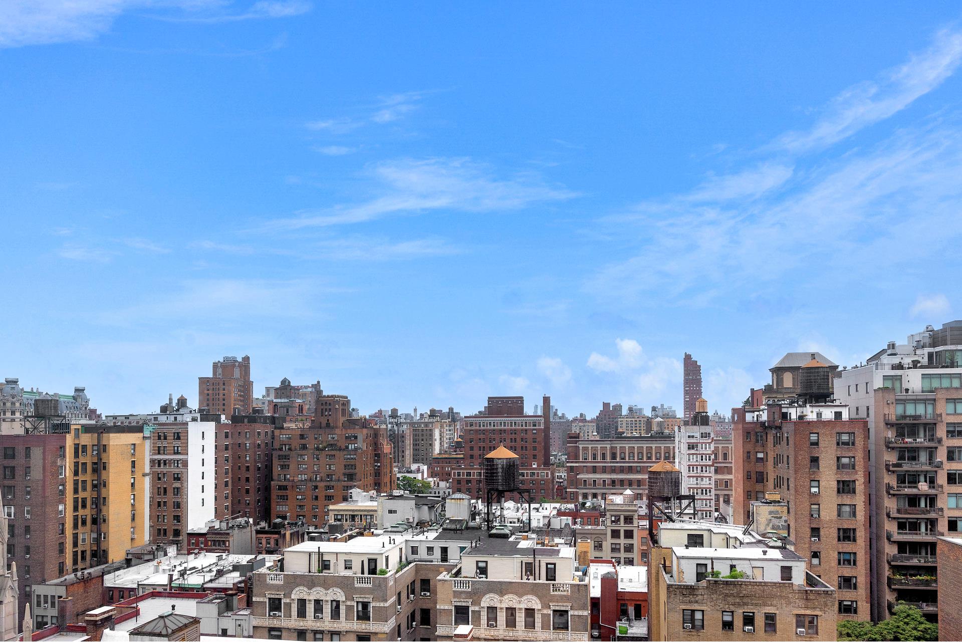 135 West 70th Street, Unit 10C Manhattan, NY 10023 - Photo 21 of 24 a view of a city with tall buildings in the background