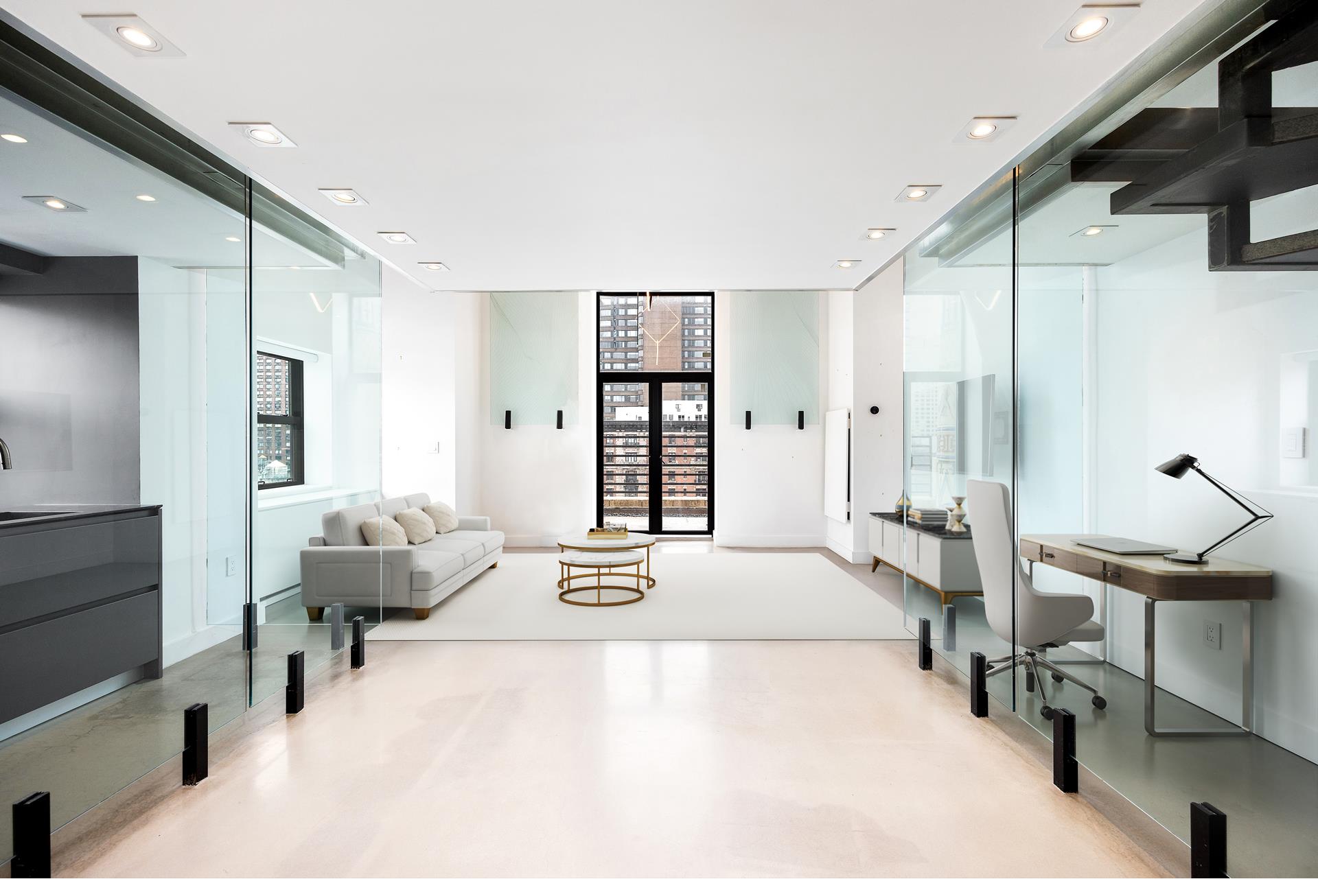 135 West 70th Street, Unit 10C Manhattan, NY 10023 - Photo 4 of 24 a large bedroom with a bed and wooden floor