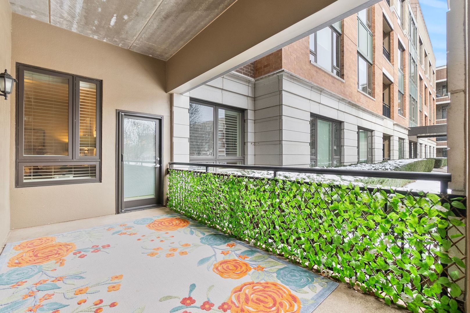 1000 Village Center Drive, Unit 102 Burr Ridge, IL 60527 - Photo 14 of 28 a front view of a house with a yard