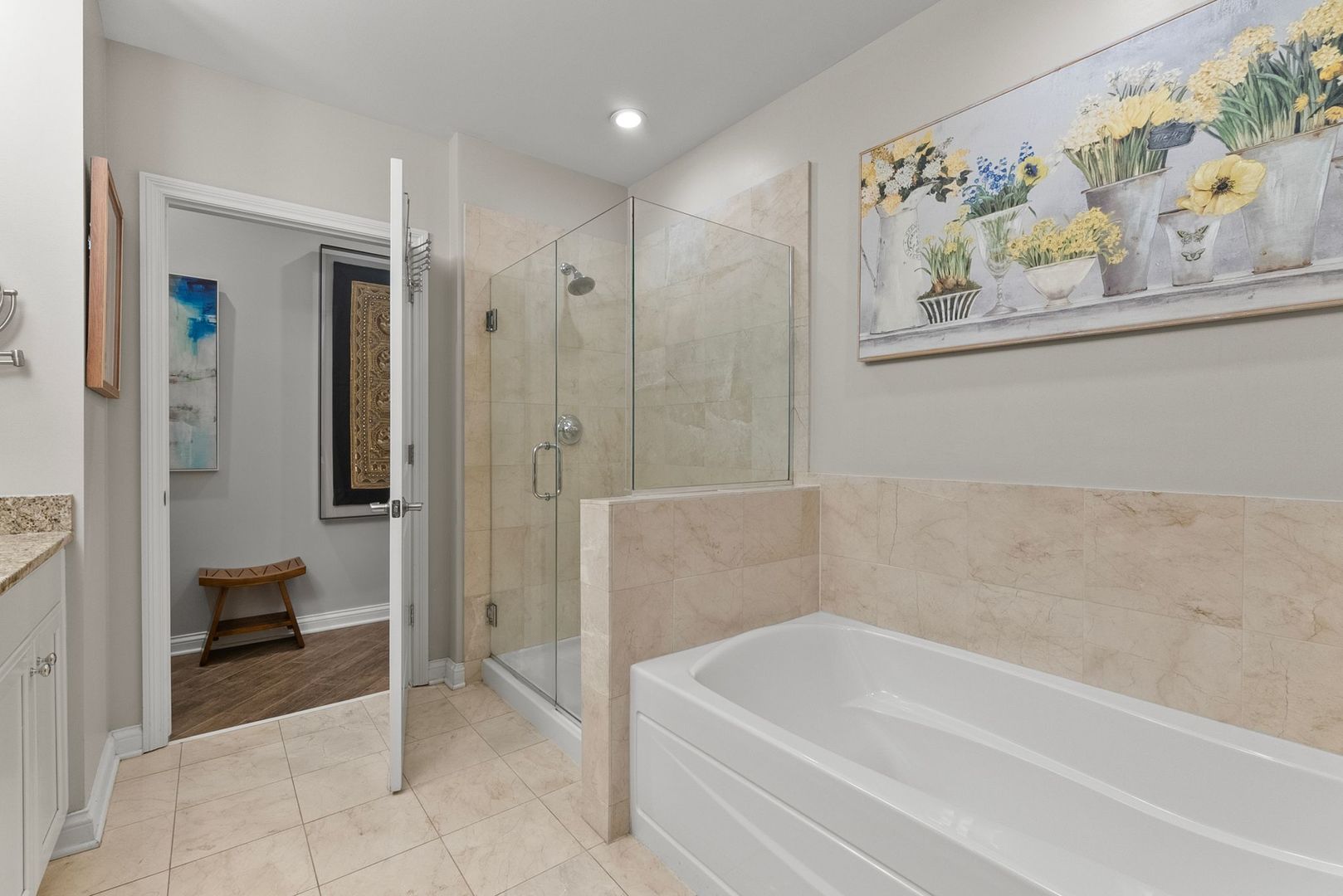 1000 Village Center Drive, Unit 102 Burr Ridge, IL 60527 - Photo 23 of 28 a bathroom with a bathtub and a shower