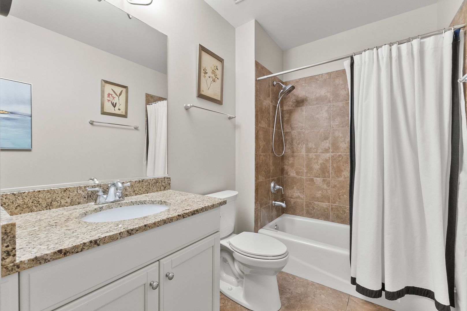 1000 Village Center Drive, Unit 102 Burr Ridge, IL 60527 - Photo 26 of 28 a bathroom with a granite countertop sink toilet and shower