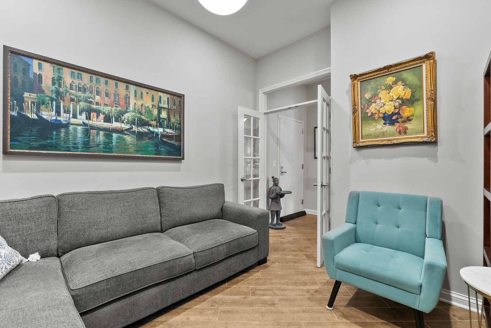 1000 Village Center Drive, Unit 102 Burr Ridge, IL 60527 - Photo 10 of 28 a living room with furniture and a large window