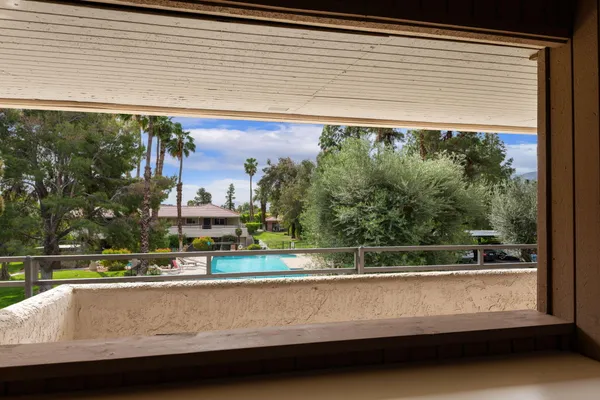 a view of outdoor space with swimming pool