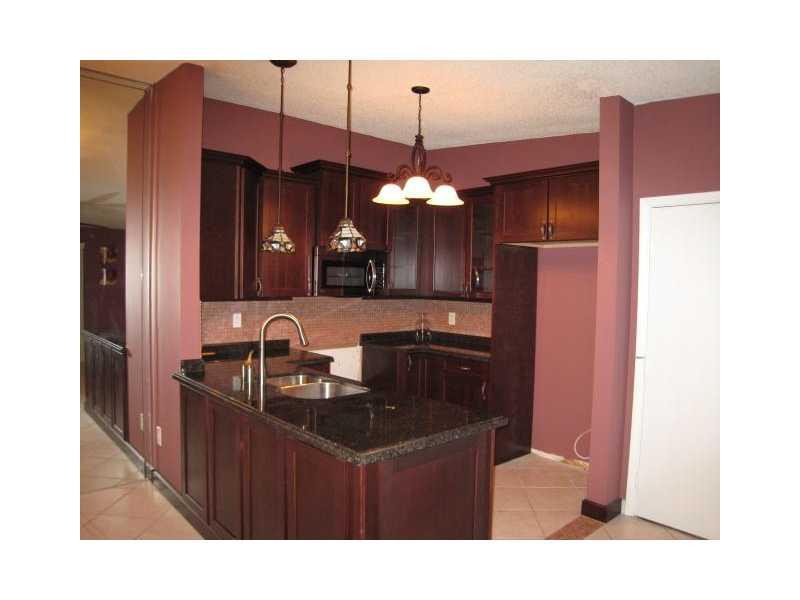 9751 West McNab Road, Unit 211 Tamarac, FL 33321 - Photo 3 of 11 Kitchen