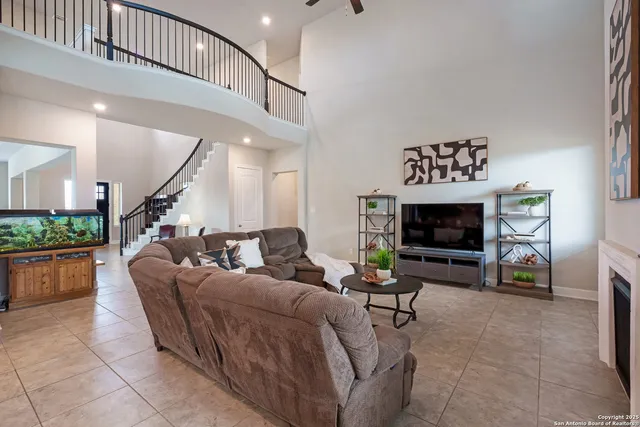 a bedroom with a bed and a night stand