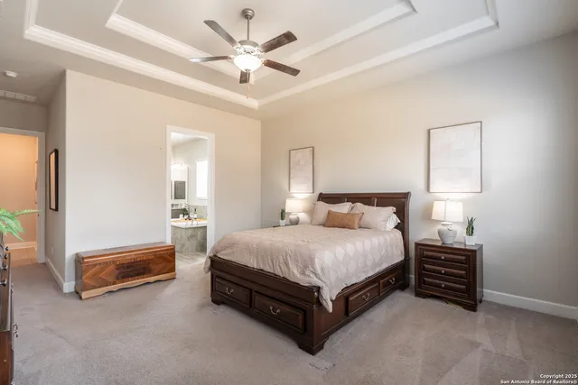 a bedroom with a bed and a table