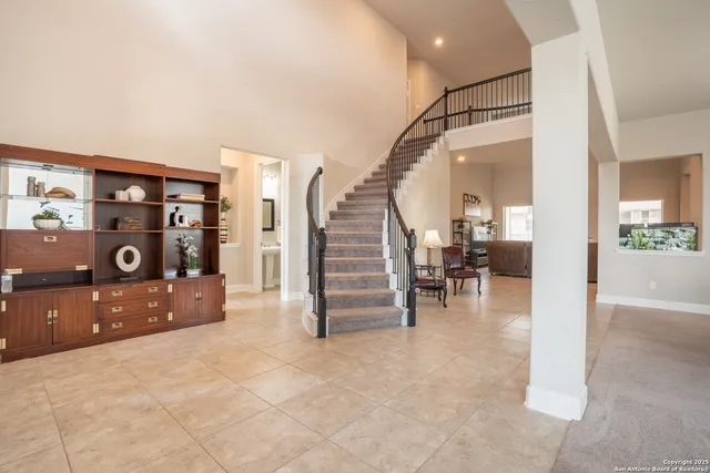 a living room with furniture and a couch