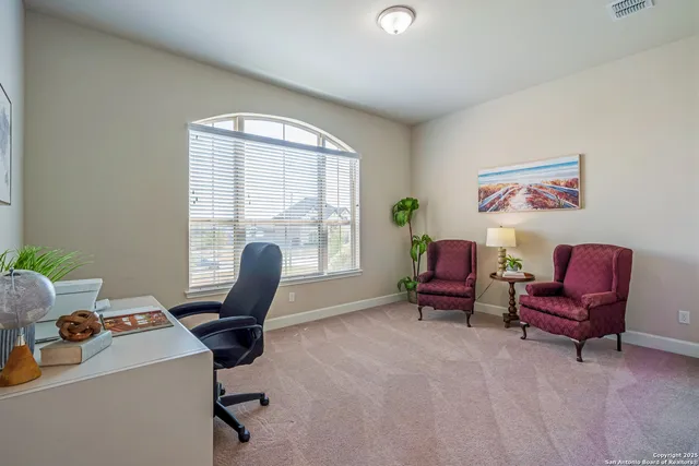 a view of a dining room with furniture