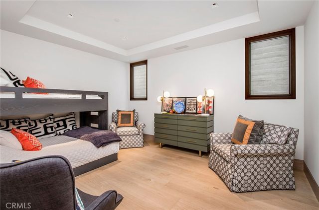 a bedroom with furniture and a couch