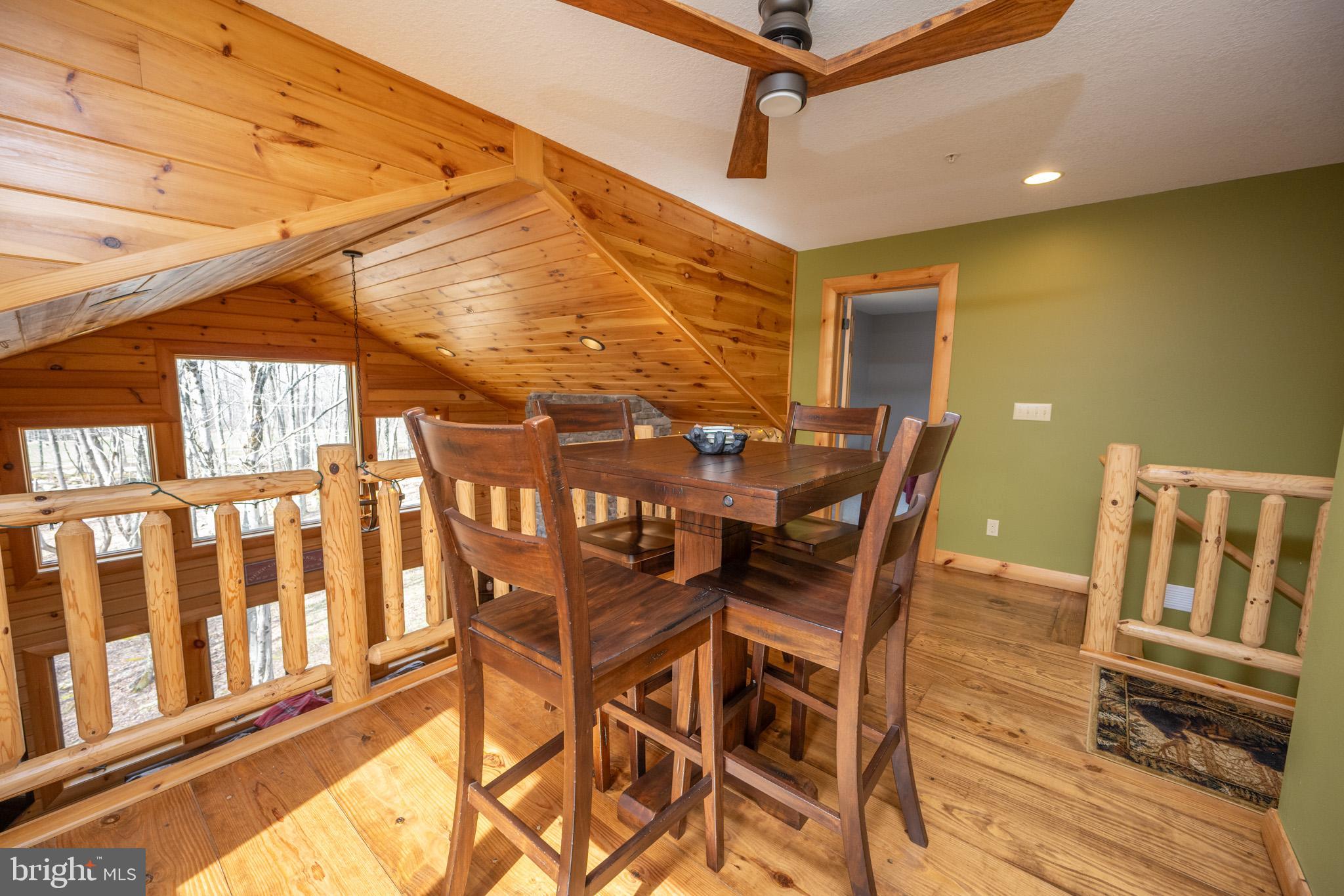 276 Sundance Way McHenry, MD 21541 - Photo 37 of 77 a view of a patio with a table and chairs