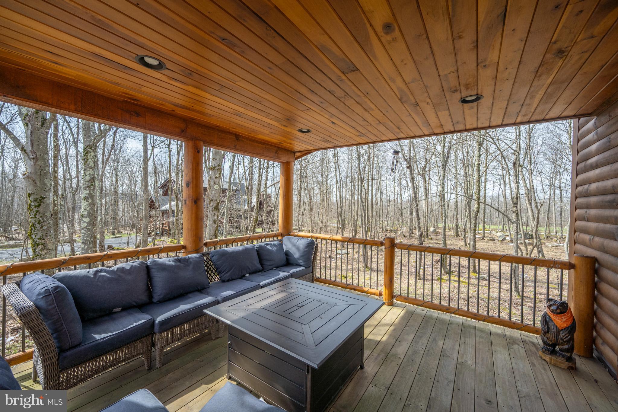 276 Sundance Way McHenry, MD 21541 - Photo 66 of 77 a living room with furniture and a large window