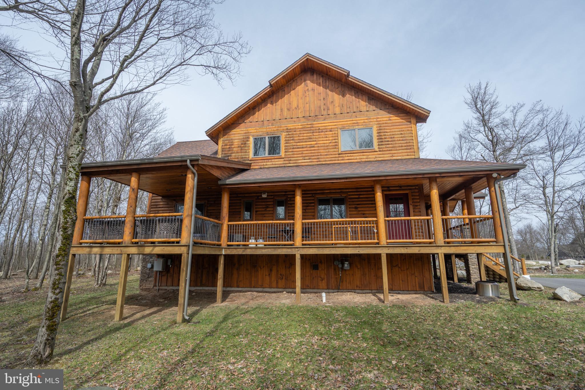 276 Sundance Way McHenry, MD 21541 - Photo 72 of 77 a front view of a house with a yard