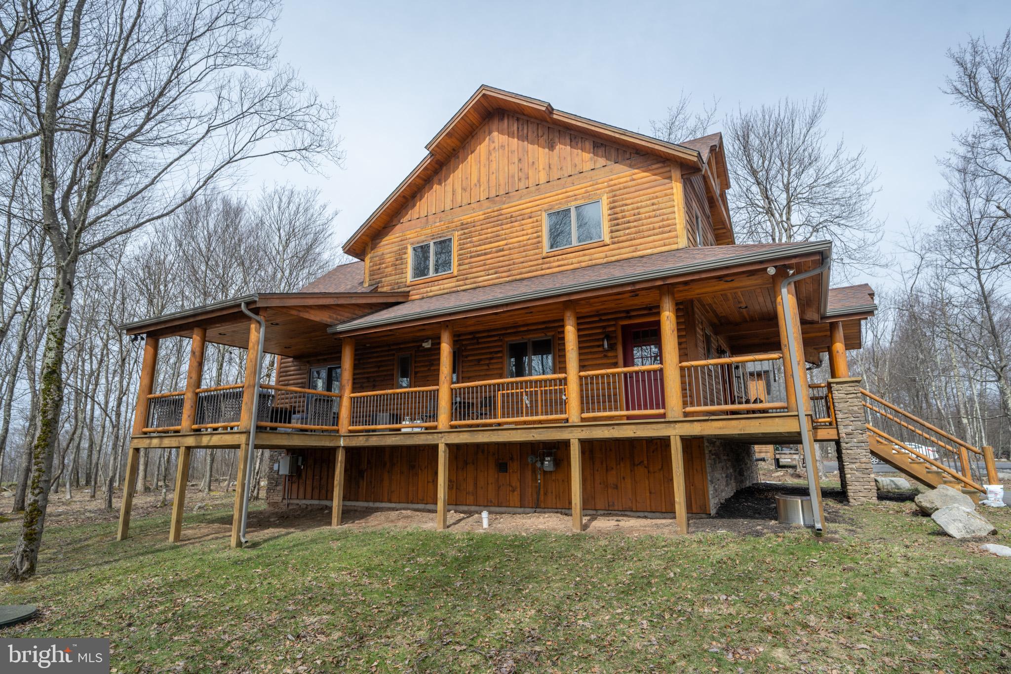 276 Sundance Way McHenry, MD 21541 - Photo 73 of 77 a front view of a house with a yard