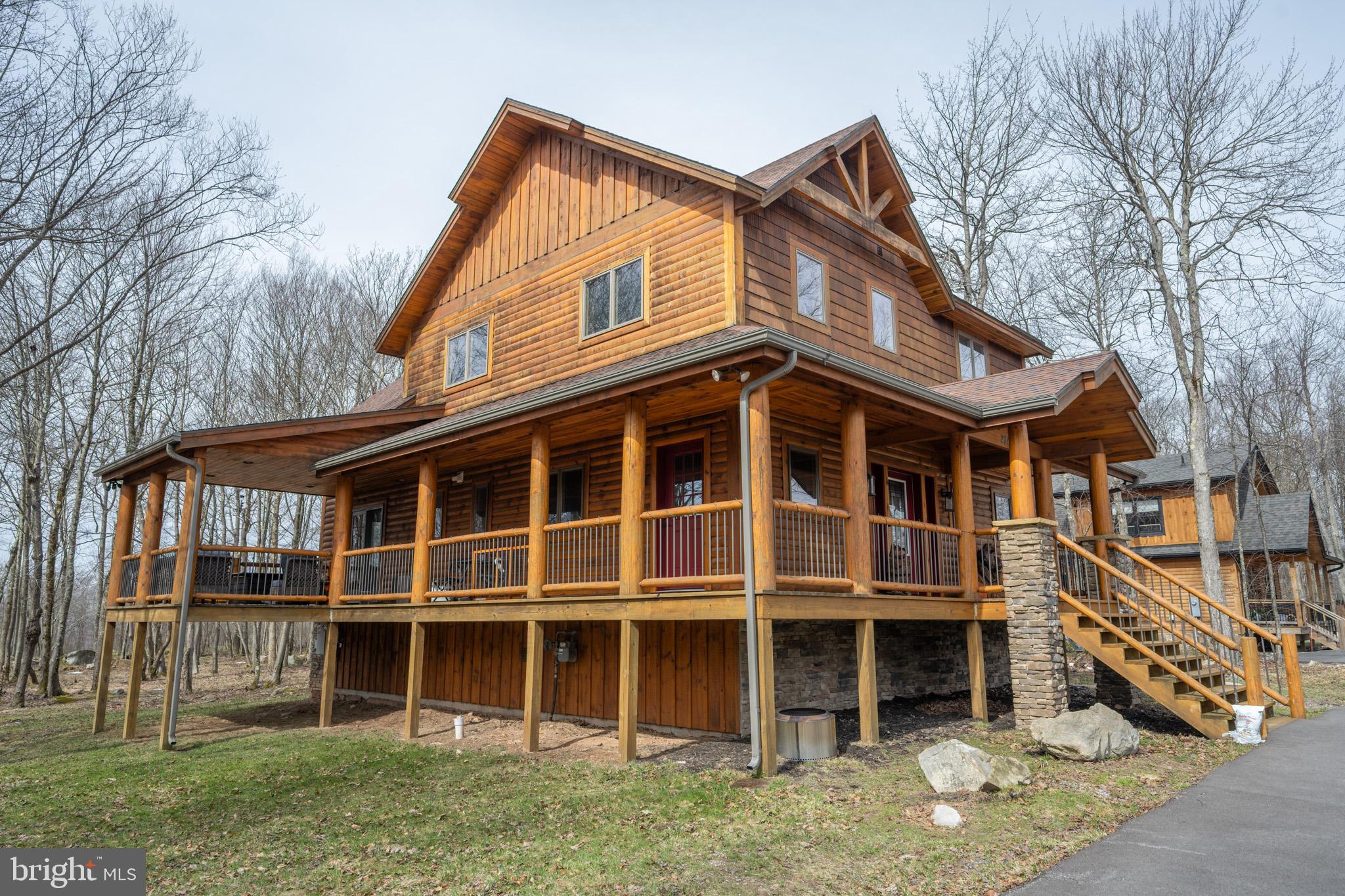 276 Sundance Way McHenry, MD 21541 - Photo 74 of 77 a front view of a house with a yard