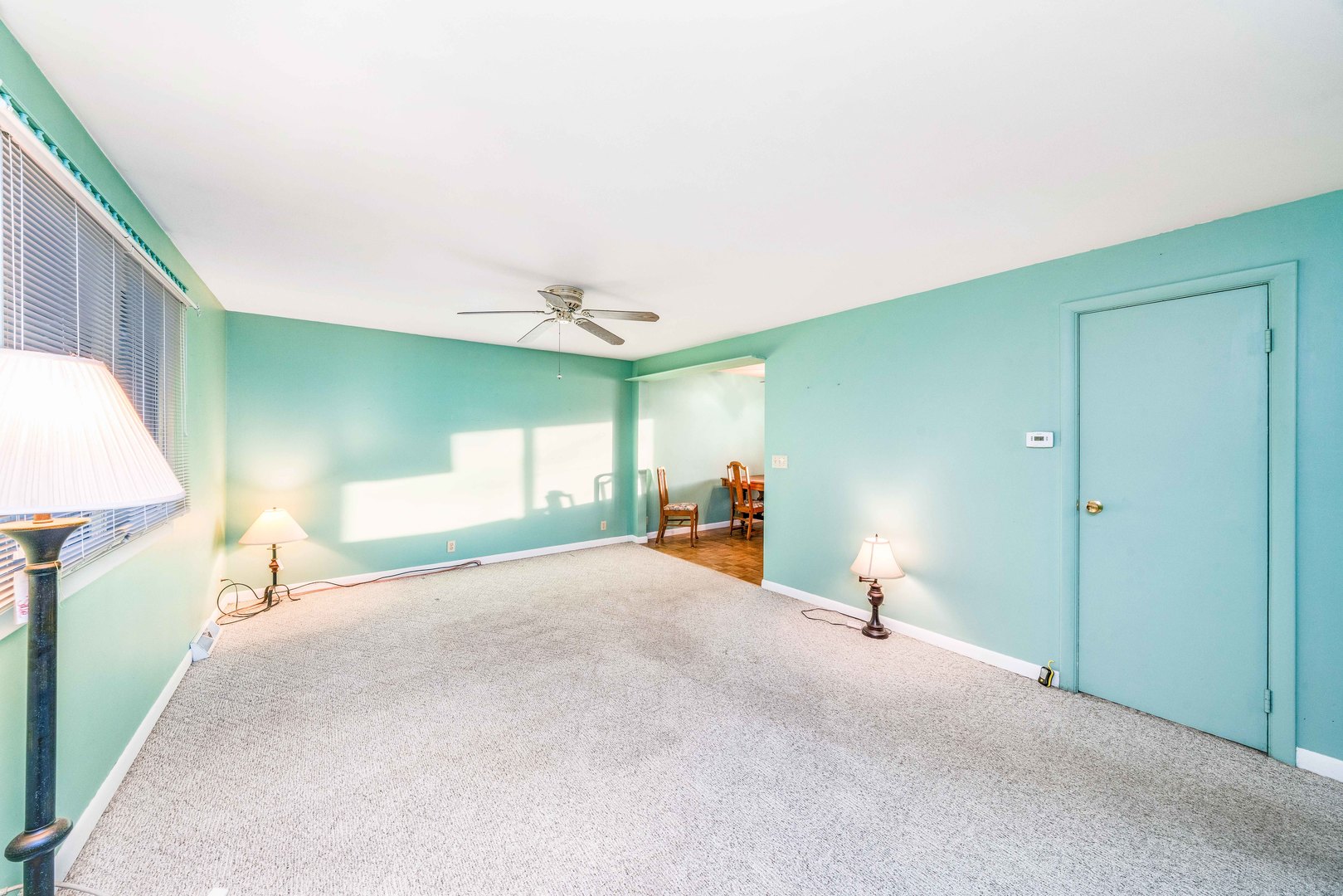 1014 Castle Street Sandwich, IL 60548 - Photo 3 of 21 a view of a livingroom with a furniture and a ceiling fan