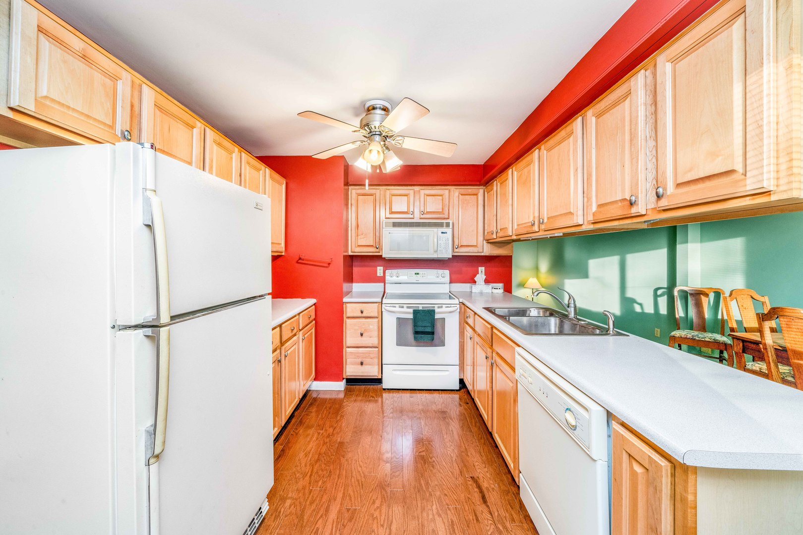 1014 Castle Street Sandwich, IL 60548 - Photo 8 of 21 a kitchen with stainless steel appliances granite countertop a refrigerator a stove and a sink