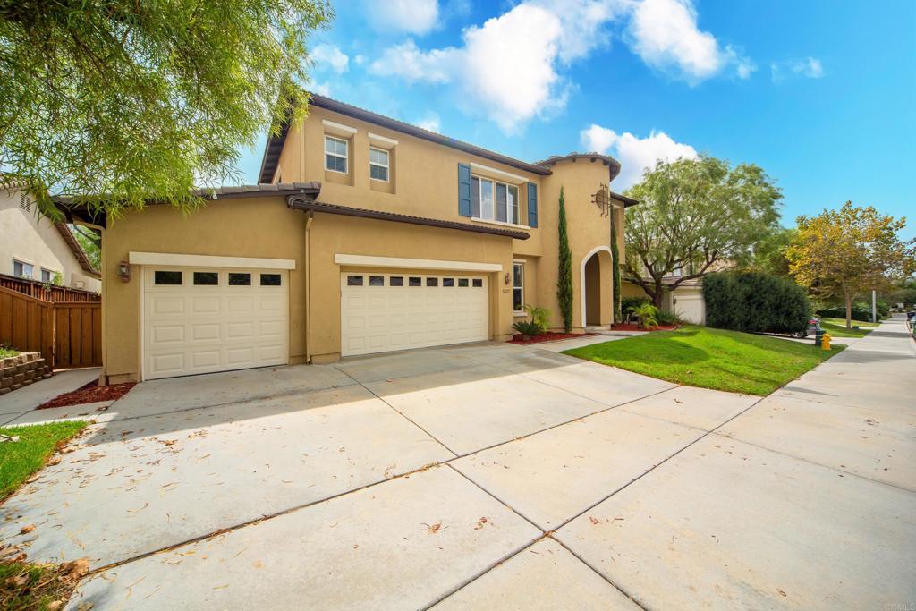 a front view of a building with garden