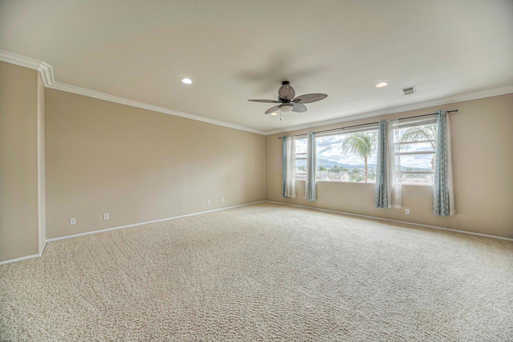 32215 Vía Bejarano Temecula, CA 92592 - Photo 19 of 42 a view of an empty room with a window
