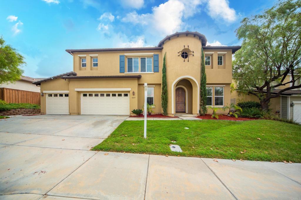 32215 Vía Bejarano Temecula, CA 92592 - Photo 3 of 42 a front view of a house with garden