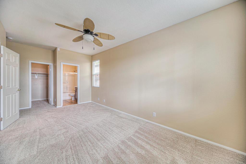 32215 Vía Bejarano Temecula, CA 92592 - Photo 37 of 42 an empty room with windows and fan