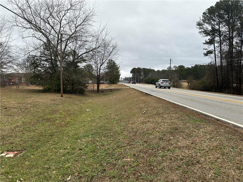 0 Flat Shoals Road Southeast Conyers, GA 30013 - Photo 4 of 6 a backyard of a house with lots of green space