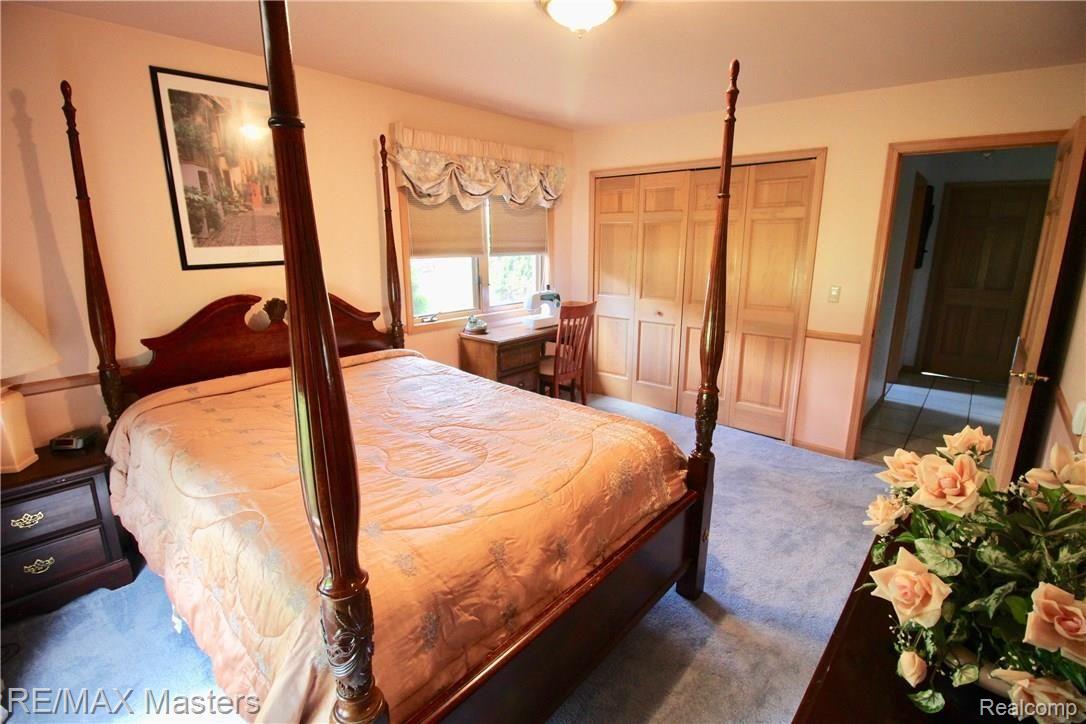 26454 Rinne Road New Boston, MI 48164 - Photo 21 of 41 2nd bedroom again, this time showing off the double closet