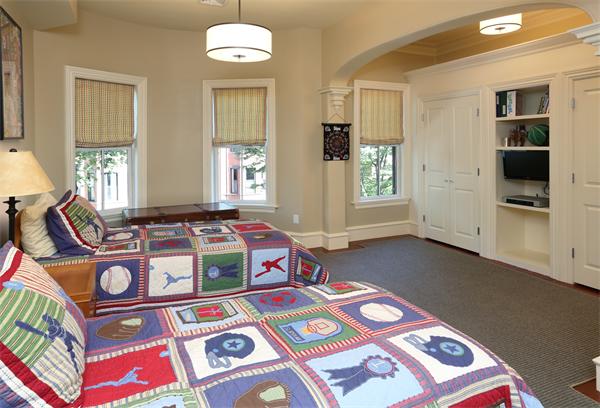 26 Braddock Park Boston, MA 02116 - Photo 14 of 25 a bedroom with furniture and a window