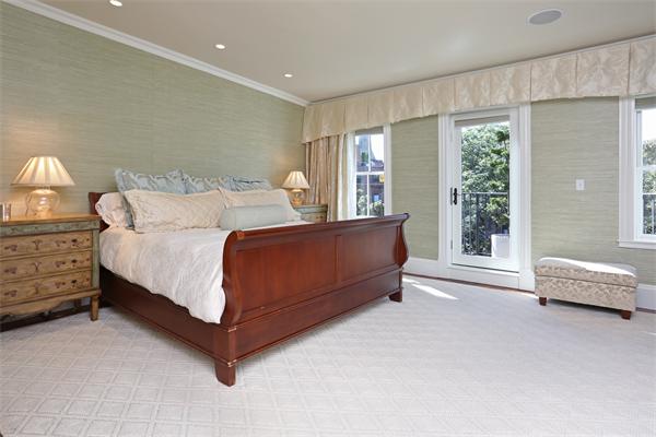 26 Braddock Park Boston, MA 02116 - Photo 17 of 25 a bedroom with a bed and a window