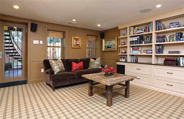 26 Braddock Park Boston, MA 02116 - Photo 8 of 25 a living room with furniture and a book shelf