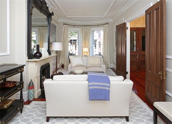 26 Braddock Park Boston, MA 02116 - Photo 10 of 25 a view of living room with furniture and a fireplace
